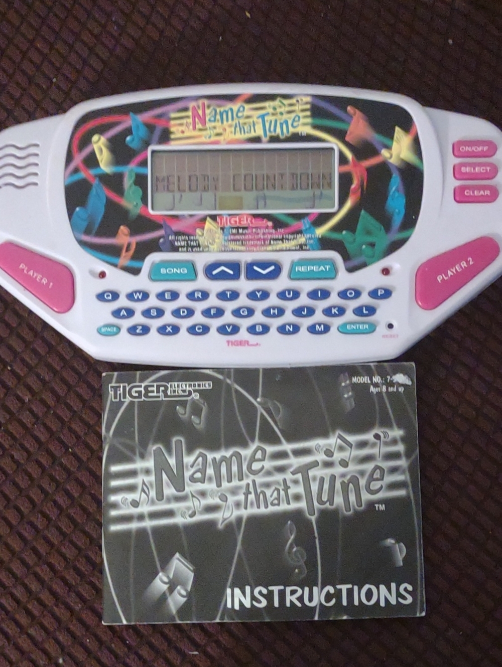Tiger Electronics Name That Tune Handheld Game - White & Pink